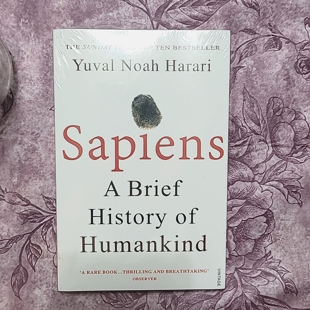 Sapiens paperback book